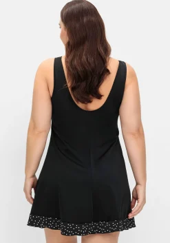 Badekleid mit Pünktchen und integrierter Hose<sheego Fashion