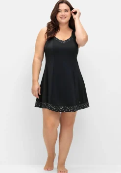 Badekleid mit Pünktchen und integrierter Hose<sheego Fashion