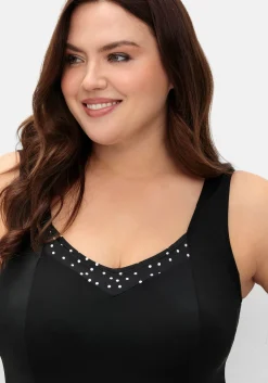 Badekleid mit Pünktchen und integrierter Hose<sheego Fashion