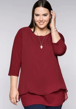 Blusenshirt in leichter A-Linie mit Zipfelsaum<sheego Fashion