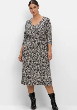 Jerseykleid in Wickeloptik, mit Blätterprint<sheego Clearance