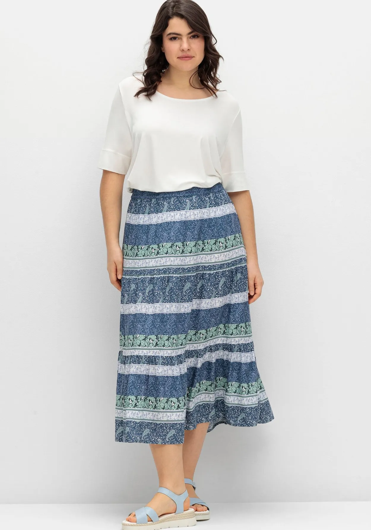 Jerseyshirt mit abgerundetem Saum<sheego Sale