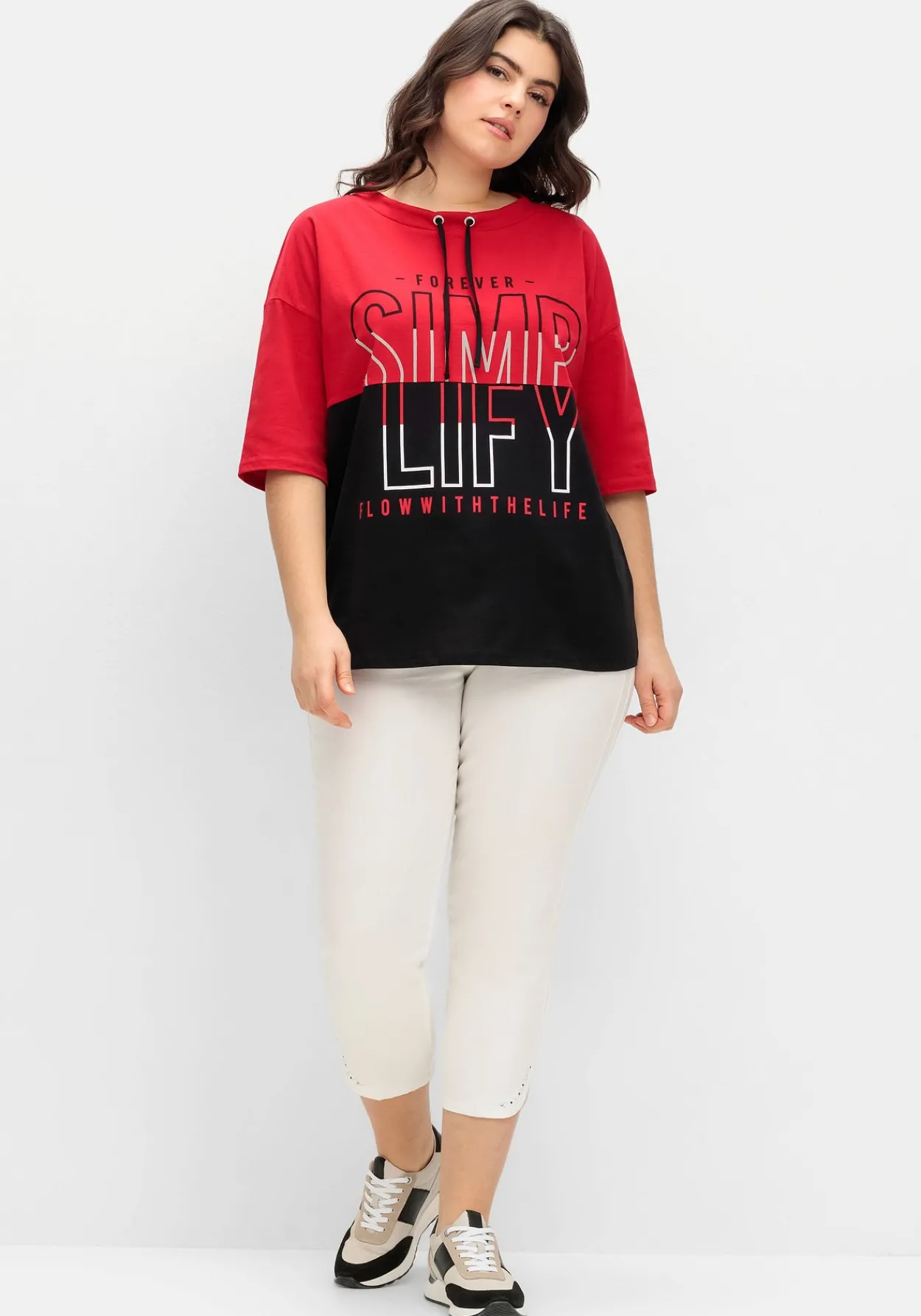 Jerseyshirt mit Stehkragen und Wordingprint<sheego Sale