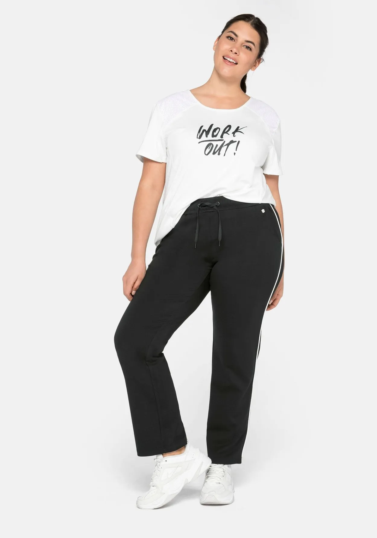 Jogginghose in weiter Form, mit Kontrastpaspel<sheego Fashion