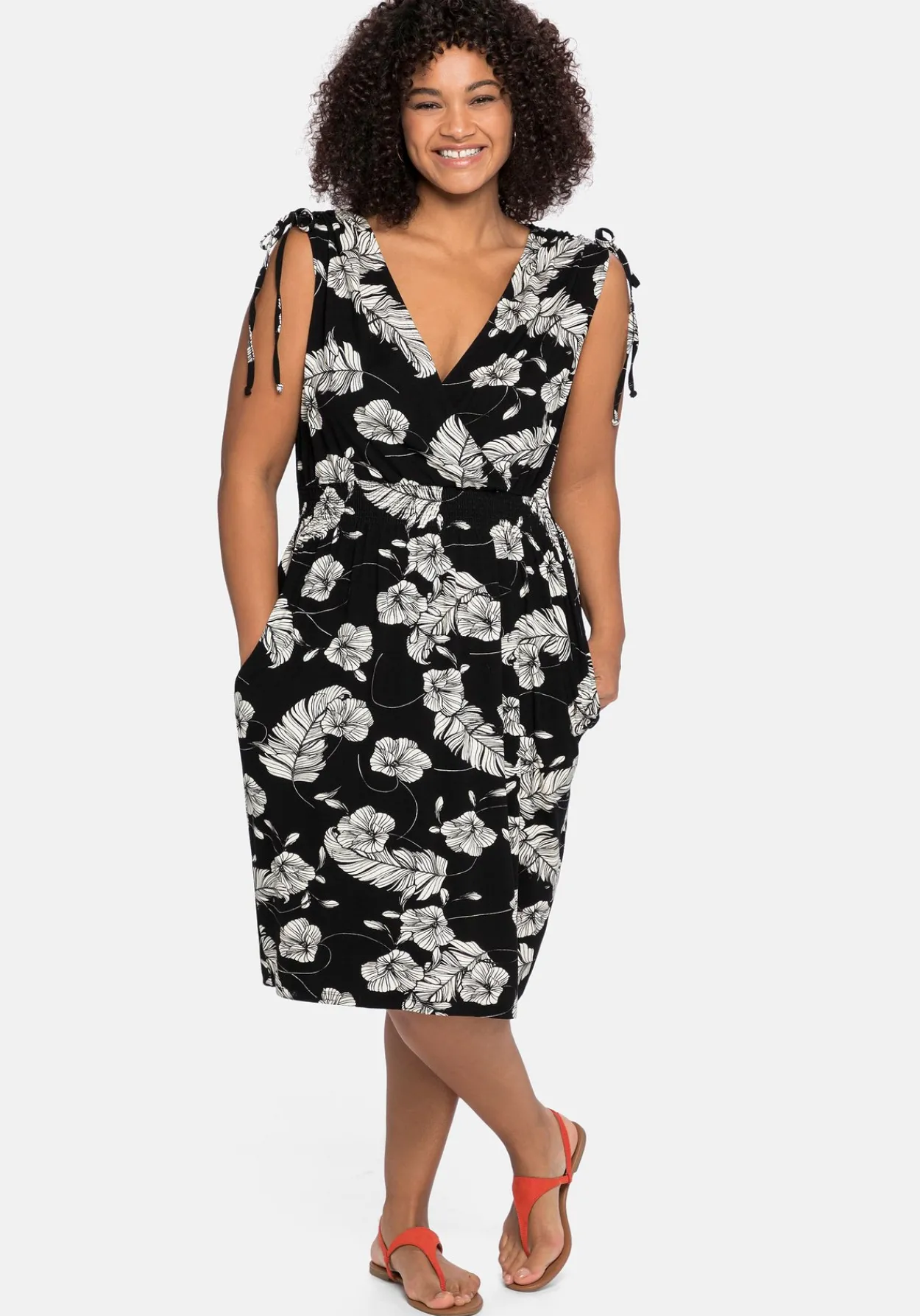 Kleid in Wickeloptik, mit floralem Druck<sheego Best