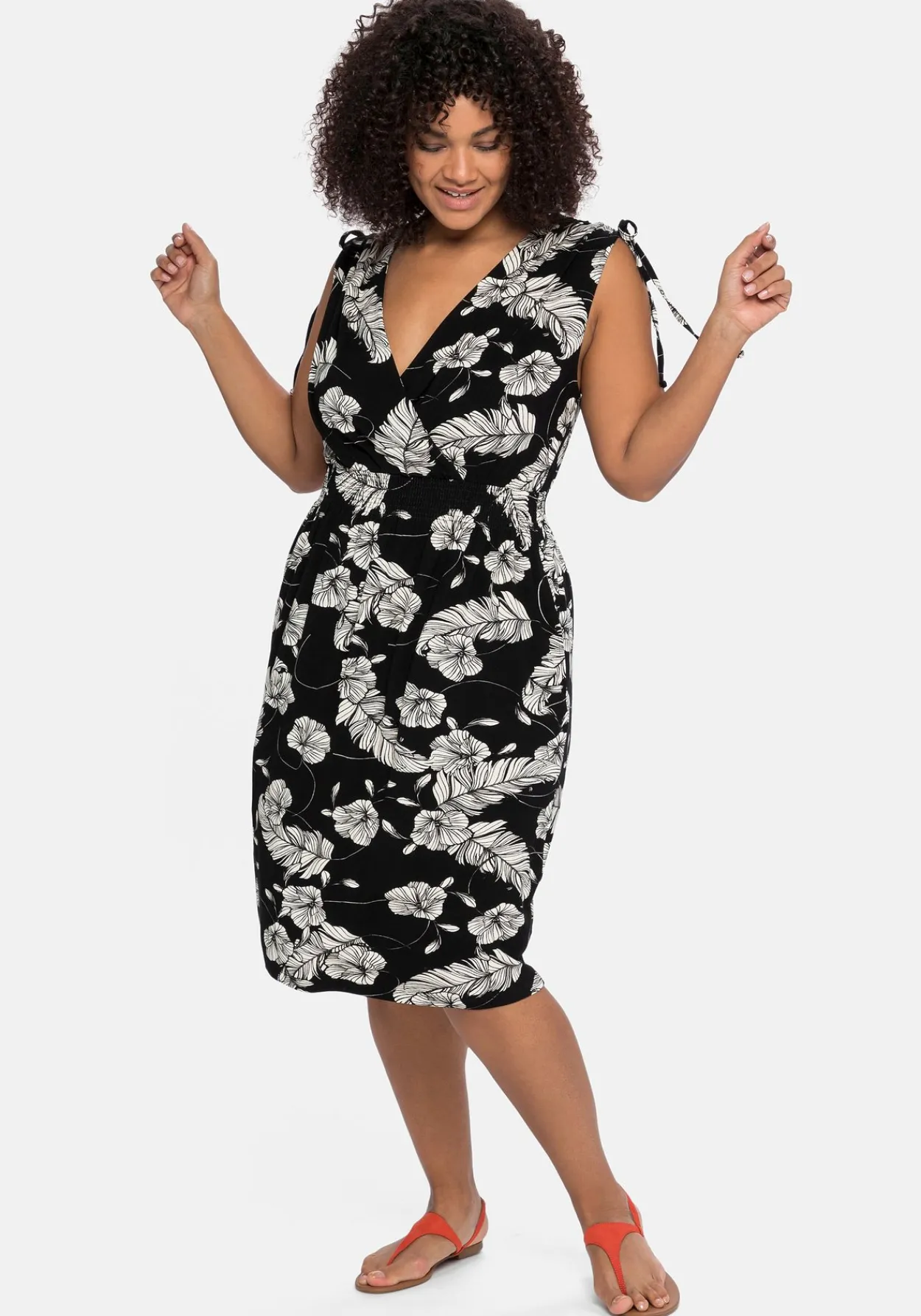 Kleid in Wickeloptik, mit floralem Druck<sheego Best