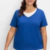 Kurzarmshirt in Layeroptik mit Ziernieten<sheego Fashion
