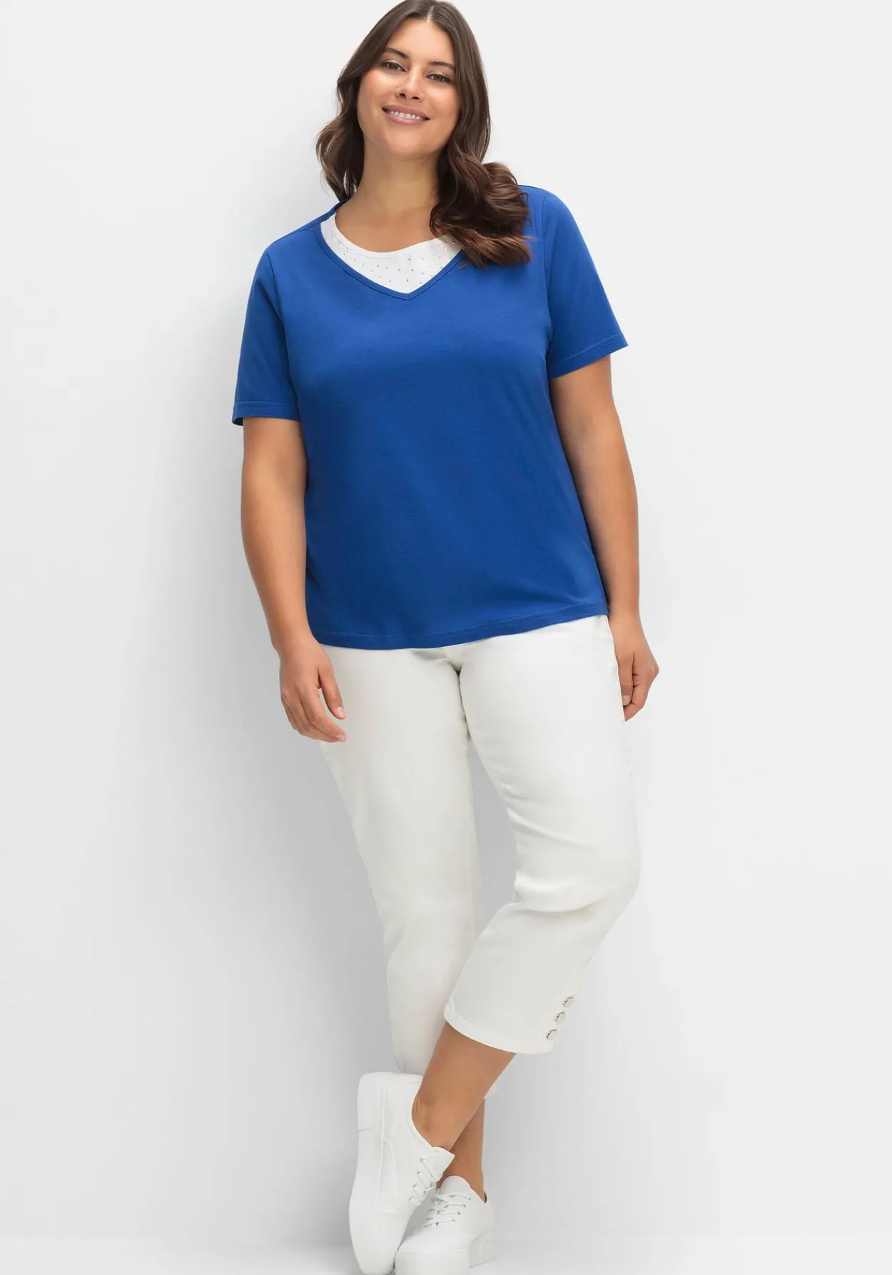 Kurzarmshirt in Layeroptik mit Ziernieten<sheego Fashion
