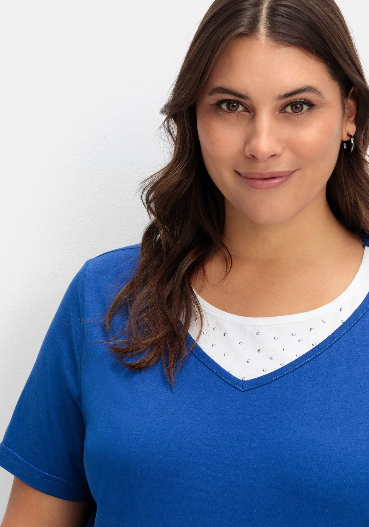 Kurzarmshirt in Layeroptik mit Ziernieten<sheego Fashion