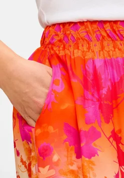 Midirock mit Multicolorprint und Gummizugbund<sheego loves miss goodlife Fashion