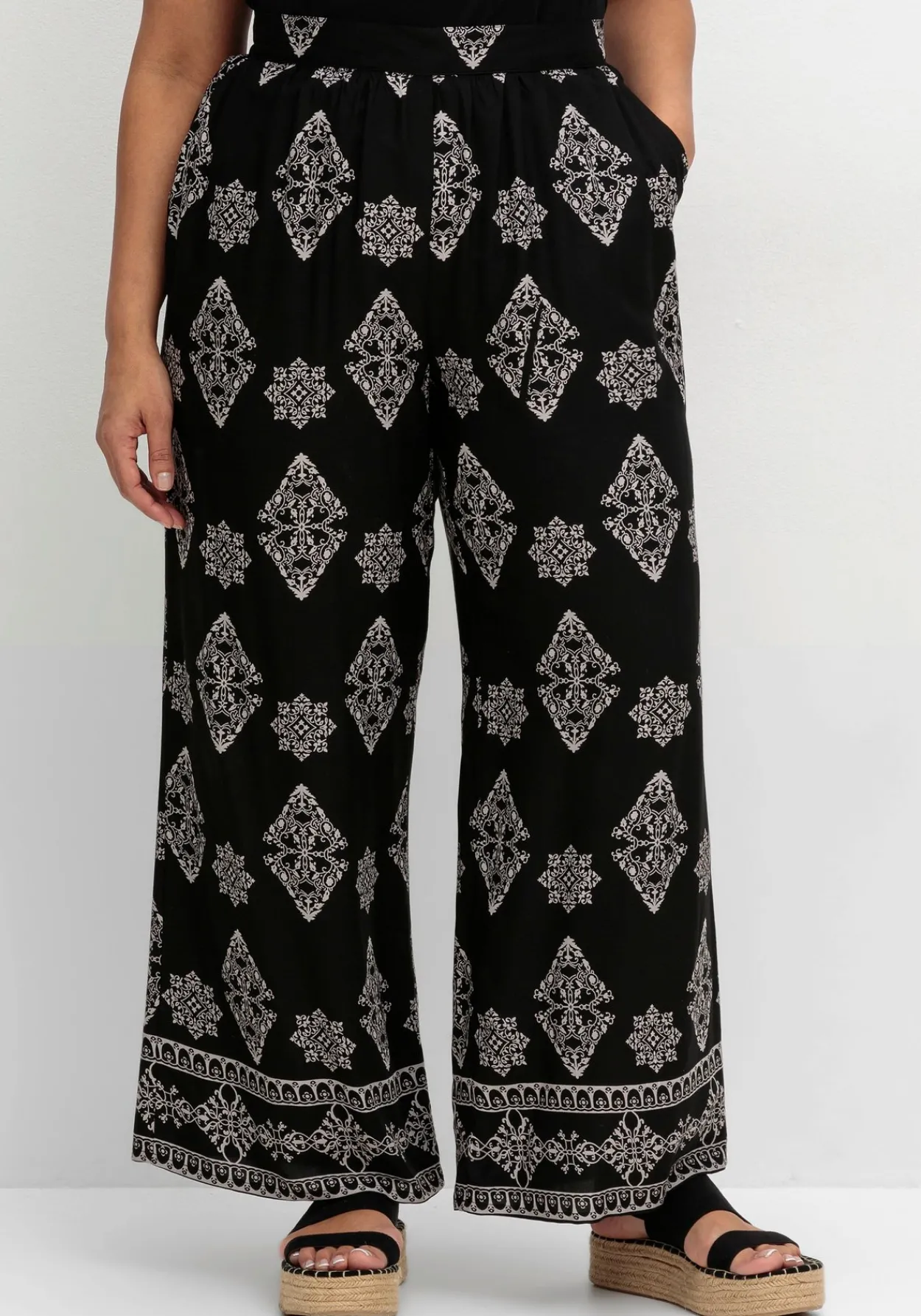 Schlupfhose mit Allover- und Bordürendruck<sheego by Joe Browns Sale