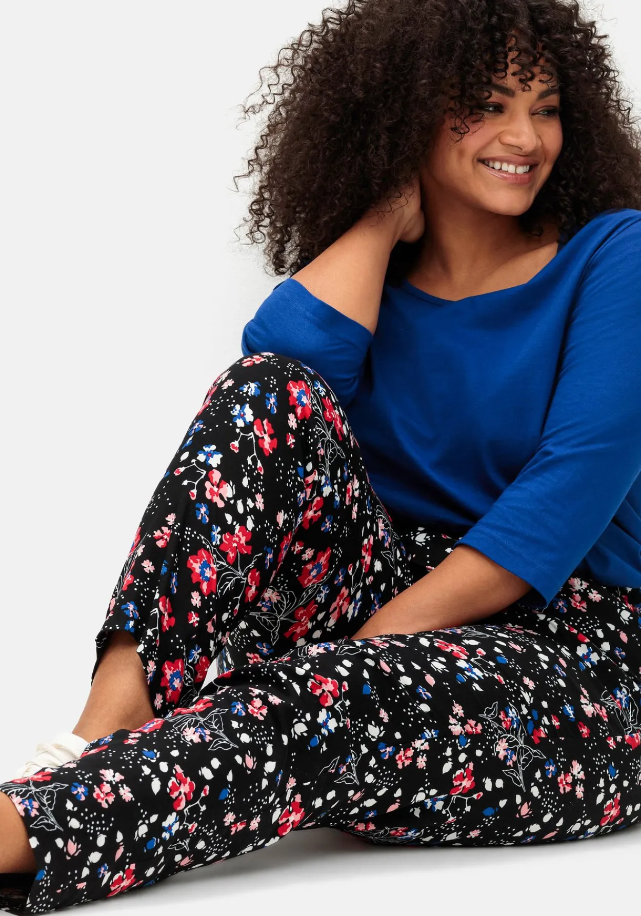 Schmale Hose mit Gummibund und Blumenprint<sheego Discount