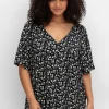 Shirt mit Blümchenprint und Knopfleiste<sheego Hot