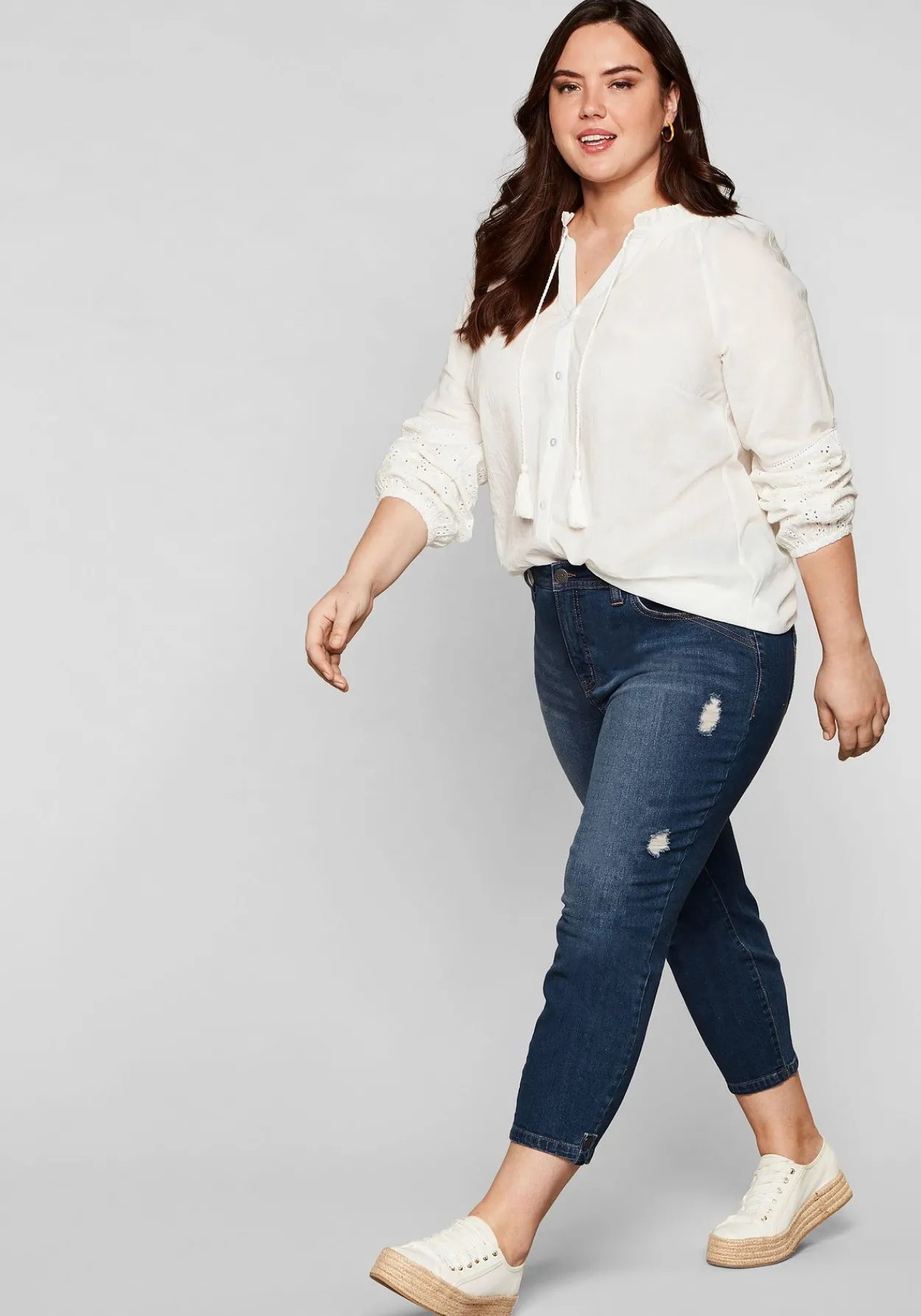Slim Fit Jeans in 7/8-Länge mit Destroyed-Effekten<sheego Hot