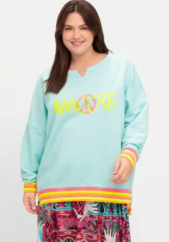 Sweatshirt mit Statementprint und Ringelbündchen<sheego loves miss goodlife Hot