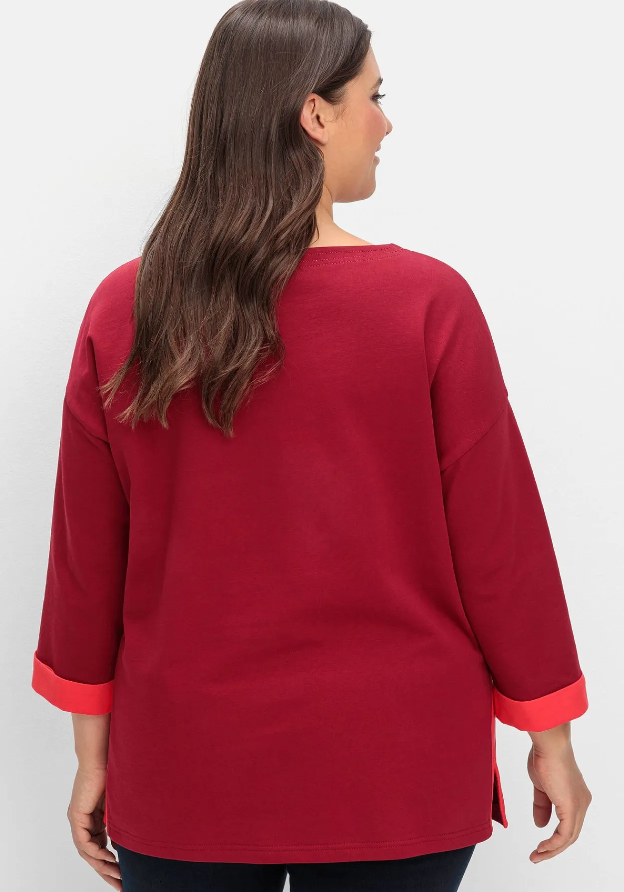 Sweatshirt mit Zierknöpfen und Kontrastdetails<sheego Online