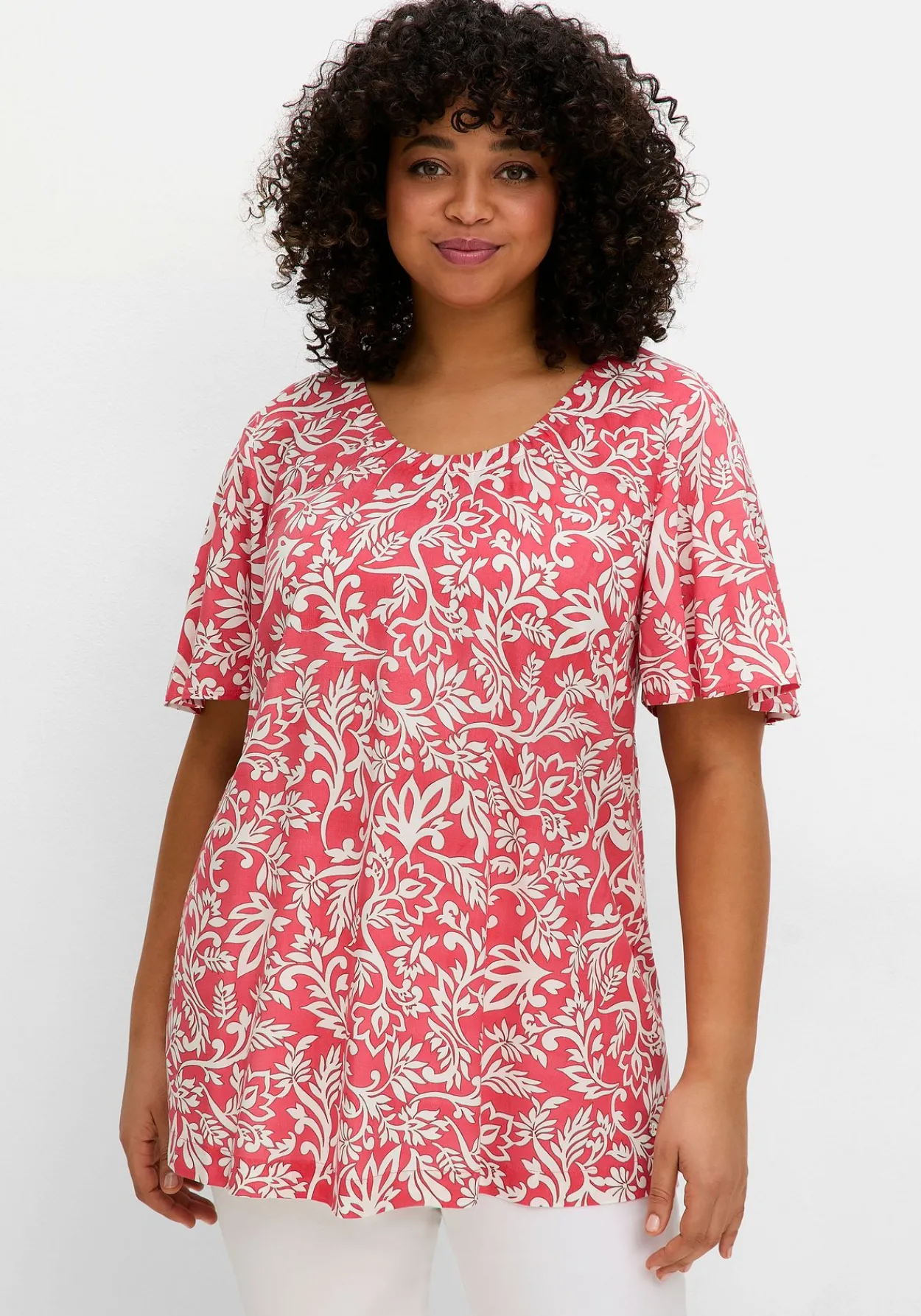 Tunika mit Blätterprint und Flügelärmeln<sheego Online