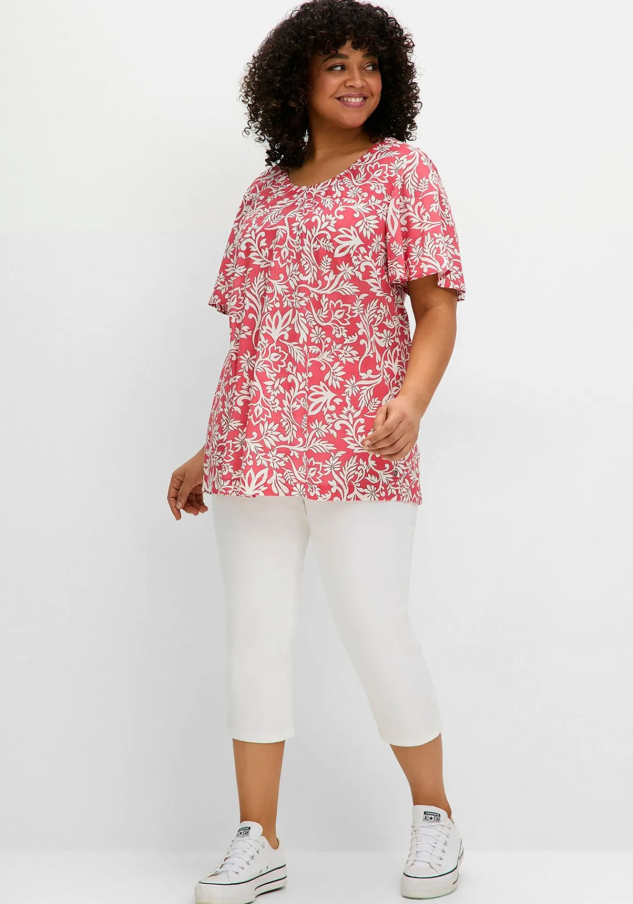 Tunika mit Blätterprint und Flügelärmeln<sheego Online