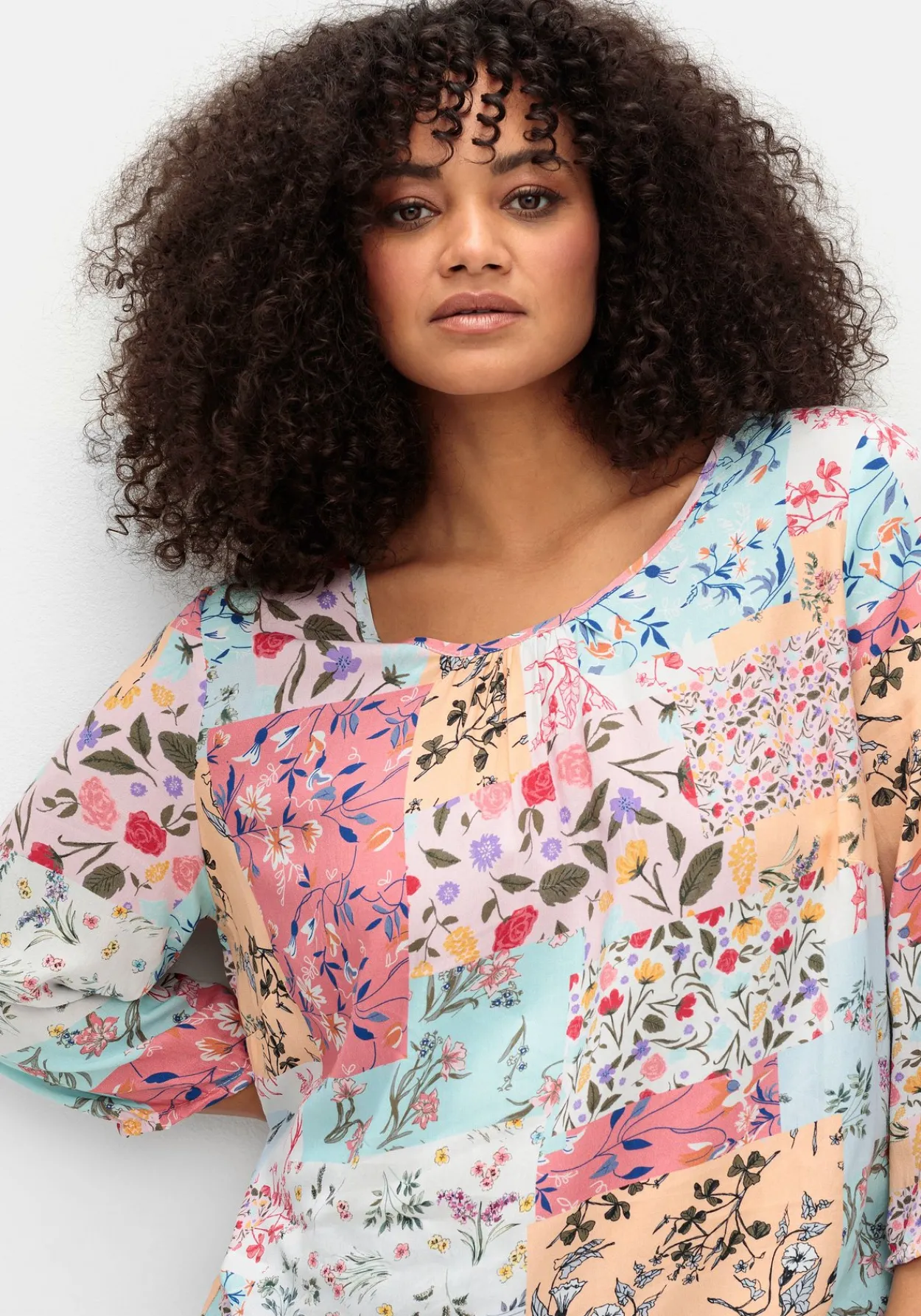 Tunika mit Patchwork-Print und Stretchsaum<sheego Outlet