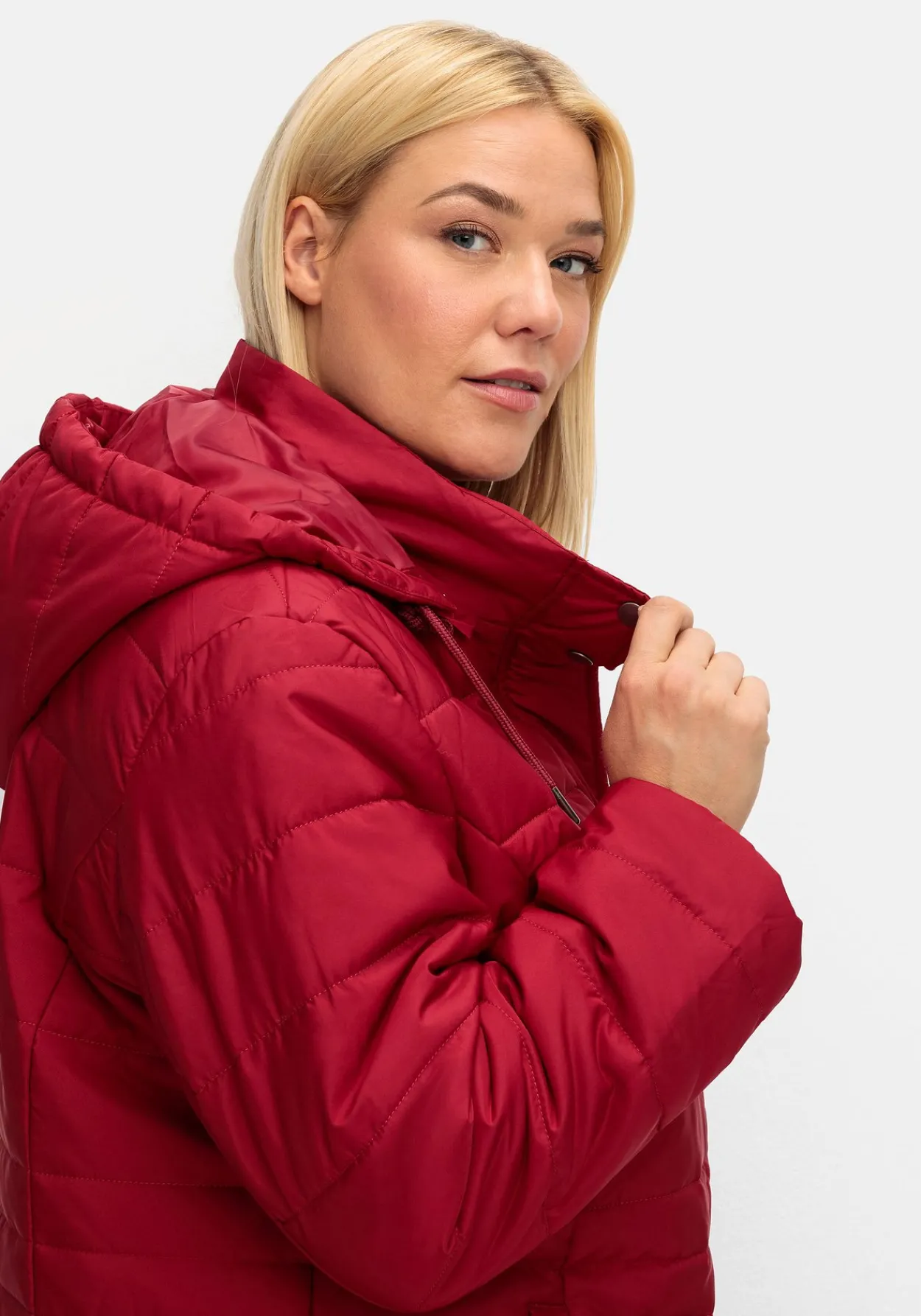 Warm wattierte Steppjacke mit Kapuze<sheego New