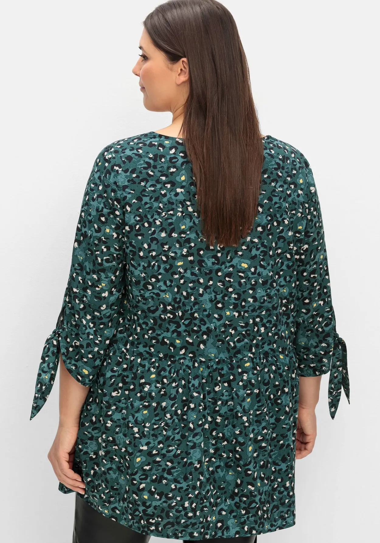 Weit schwingende Tunika mit Alloverprint<sheego Fashion