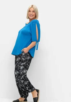 Weite Hose mit Blätterprint und breitem Smokbund<sheego Online