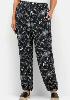 Weite Hose mit Blätterprint und breitem Smokbund<sheego Online