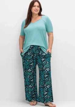 Weite Schlupfhose mit Smokbund und Blätterprint<sheego Hot